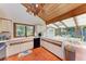 Bright kitchen and breakfast area with tile flooring, ample counter space, and a breakfast nook at 8270 Manasota Key Rd, Englewood, FL 34223