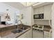 Functional kitchen with stainless steel sink, neutral cabinets, and efficient appliances at 902 Gibbs Rd # 282, Venice, FL 34285