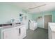 Bright and spacious communal laundry room at 902 Gibbs Rd # 282, Venice, FL 34285