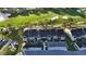 Stunning aerial view showcasing the property's proximity to a lush golf course and beautiful surroundings at 9570 High Gate Dr # 1722, Sarasota, FL 34238