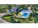 Overhead view of the community pool and surrounding tropical landscaping at 9570 High Gate Dr # 1722, Sarasota, FL 34238