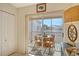Cozy, screened-in balcony with an outdoor dining set at 9570 High Gate Dr # 1722, Sarasota, FL 34238