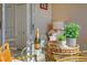 Cozy balcony featuring a glass table, wine, and charming decor creating an inviting outdoor space at 9570 High Gate Dr # 1722, Sarasota, FL 34238