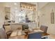 Eat-in kitchen area with table, pendant lights, and views to the kitchen at 9570 High Gate Dr # 1722, Sarasota, FL 34238