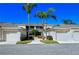 Beautiful condo complex featuring well-manicured landscaping and attached garages in a desirable community at 9570 High Gate Dr # 1722, Sarasota, FL 34238