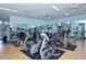 Well-equipped gym with treadmills, stationary bikes, weight machines, and free weights at 9570 High Gate Dr # 1722, Sarasota, FL 34238