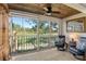 Relaxing lanai with wood ceiling and view of lush golf course at 9570 High Gate Dr # 1722, Sarasota, FL 34238