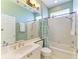 Bathroom featuring a vanity with one sink, updated lighting and tub with shower at 9734 51St Terr E, Bradenton, FL 34211