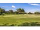 Expansive green golf course with gentle rolling hills and distant water feature at 9734 51St Terr E, Bradenton, FL 34211