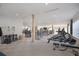 Spacious gym with cardio machines, free weights, and natural light at 9734 51St Terr E, Bradenton, FL 34211