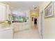 Bright kitchen with seamless access to the living and dining areas at 9734 51St Terr E, Bradenton, FL 34211