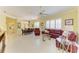 Open concept floor plan with a seamless flow between the living and dining areas at 9734 51St Terr E, Bradenton, FL 34211