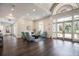 Bright lobby features a seating area, high ceilings, and elegant decor, creating an inviting and luxurious ambiance at 9734 51St Terr E, Bradenton, FL 34211