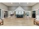 Spacious community center lobby with high ceilings, stone accents, and elegant decor at 9767 50Th Street E Cir, Parrish, FL 34219