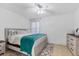 Bright bedroom with natural light and tile flooring exudes comfort and style at 1110 Villagio Cir # 103, Sarasota, FL 34237