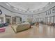 Expansive lobby area with tile flooring, comfortable seating, and ample natural light at 1110 Villagio Cir # 103, Sarasota, FL 34237