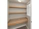 Dedicated workspace features built-in desk, shelving, and natural light for a productive work environment at 1110 Villagio Cir # 103, Sarasota, FL 34237