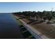 Aerial view of lakeside park with walking path at 1110 Villagio Cir # 103, Sarasota, FL 34237