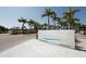 Entrance sign to Siesta Beach, showcasing the beautiful Sarasota County park on a sunny day at 1110 Villagio Cir # 103, Sarasota, FL 34237