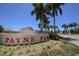 Sign for Payne Park with palm trees and a fountain in the background on a sunny day at 1110 Villagio Cir # 103, Sarasota, FL 34237