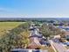 A wide shot of a rural community with a large pond on a sunny day at 11213 2Nd E Ave, Bradenton, FL 34212