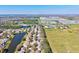 Aerial view shows residential area with ponds, green spaces, and nearby community amenities at 11213 2Nd E Ave, Bradenton, FL 34212