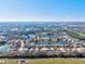 An aerial view of a neighborhood with homes surrounding a scenic pond at 11213 2Nd E Ave, Bradenton, FL 34212