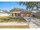 Charming single-story home features a well-manicured lawn, two car garage, and inviting front entrance at 11213 2Nd E Ave, Bradenton, FL 34212
