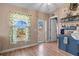 Bright and airy kitchen area featuring a coffee bar, ample sunlight, and cozy decor at 11213 2Nd E Ave, Bradenton, FL 34212