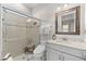 Modern bathroom featuring a glass-enclosed shower, updated vanity, and tile floors at 11553 11Th E Ave, Bradenton, FL 34212