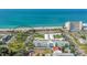 Stunning aerial view of a condo building with beautiful beach and ocean views from every unit at 129 Wayforest Dr, Venice, FL 34292