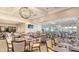 Elegant dining room features tasteful decor, ample seating, and a bright, inviting atmosphere for memorable gatherings at 129 Wayforest Dr, Venice, FL 34292