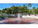 A splash pad fountain in the park perfect for and adults to cool off and relax at 129 Wayforest Dr, Venice, FL 34292