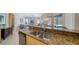 Kitchen features granite countertops, stainless steel dishwasher, and an undermount sink at 129 Wayforest Dr, Venice, FL 34292
