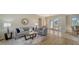 Cozy living room with stylish décor and ample natural light offering relaxation and entertainment at 129 Wayforest Dr, Venice, FL 34292
