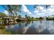 Picturesque water feature with fountain and gazebo offers serene views and adds to the community's tranquil ambiance at 129 Wayforest Dr, Venice, FL 34292