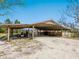 Large covered storage area perfect for storing farm equipment at 15101 Rawls Rd, Sarasota, FL 34240