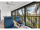 Relaxing screened balcony with comfortable seating and scenic views, offering a peaceful outdoor retreat at 1519 Pelican Point Dr # 288, Sarasota, FL 34231