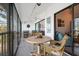 This bright balcony features seating and water views, extending the living space outdoors for dining and relaxation at 1519 Pelican Point Dr # 288, Sarasota, FL 34231