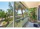 Balcony showcasing a charming outdoor setting with a lush garden view, providing an inviting and peaceful retreat at 1519 Pelican Point Dr # 288, Sarasota, FL 34231