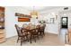 Inviting dining area features stylish furnishings and a seamless transition to the modern kitchen, perfect for entertaining at 1519 Pelican Point Dr # 288, Sarasota, FL 34231