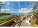 Relaxing community observation deck with benches, offering serene waterfront views and a tranquil space at 1519 Pelican Point Dr # 288, Sarasota, FL 34231