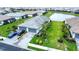 Beautiful home with manicured lawn, three car garage, and stunning landscaping in a desirable community at 16111 Sunny Day Dr, Bradenton, FL 34211
