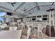Covered outdoor seating area with full bar for community residents to enjoy refreshments and socializing at 16111 Sunny Day Dr, Bradenton, FL 34211