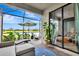 Outdoor screened patio with view, comfortable seating, and stylish decor perfect for outdoor living at 16111 Sunny Day Dr, Bradenton, FL 34211