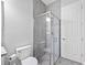 Bathroom featuring tiled walk-in shower with glass door at 17519 Polo Trl, Lakewood Ranch, FL 34211