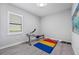 Home exercise room featuring gym mat and free weights at 17519 Polo Trl, Lakewood Ranch, FL 34211