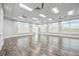 Spacious yoga studio offering wood floors, recessed lighting and an open concept layout for fitness activities at 17519 Polo Trl, Lakewood Ranch, FL 34211