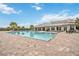 Large community swimming pool featuring brick pavers and plenty of seating for residents at 17519 Polo Trl, Lakewood Ranch, FL 34211