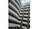 Interior atrium with balconies and abundant light throughout the building at 1771 Ringling Blvd # 902, Sarasota, FL 34236